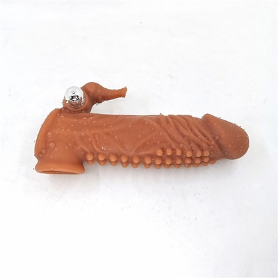 O preservativo reusável do silicone com os preservativos da bainha do vibrador da luva do galo para o sexo do prolongamento dos homens brinca a luva do pênis