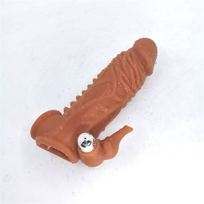 O preservativo reusável do silicone com os preservativos da bainha do vibrador da luva do galo para o sexo do prolongamento dos homens brinca a luva do pênis