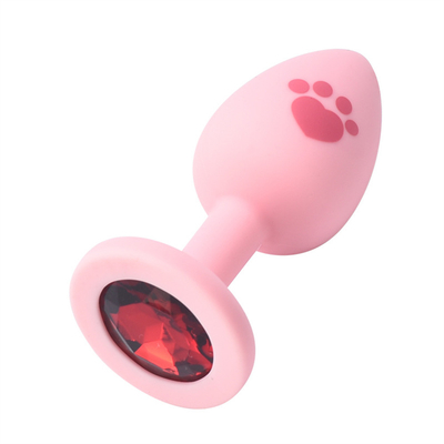 O sexo adulto brinca a tomada anal da extremidade do silicone médico com a gema plástica colorida