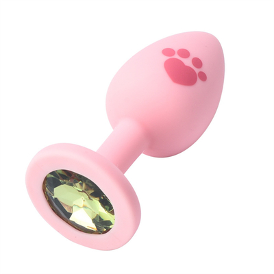 O sexo adulto brinca a tomada anal da extremidade do silicone médico com a gema plástica colorida